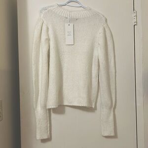A cozy and chic soft knitted sweater.